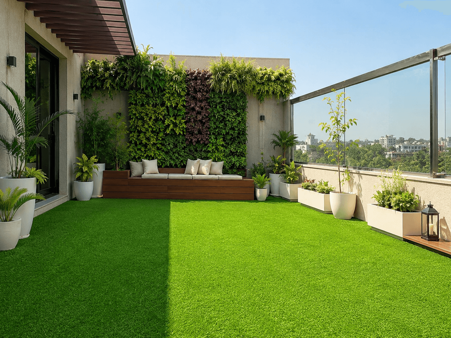 Landscaped terrace with green grass, planters, and a vertical garden